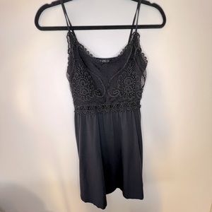 Brand New! Never worn! Top shop black mini dress with lace design in chest area!
